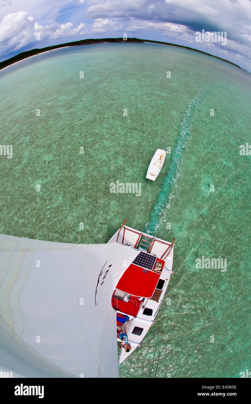 View from the masthead of 30ft Tiki catamaran 'Abaco'. Exumas, Bahamas, Caribbean. June 2009, Model and property released. Stock Photo