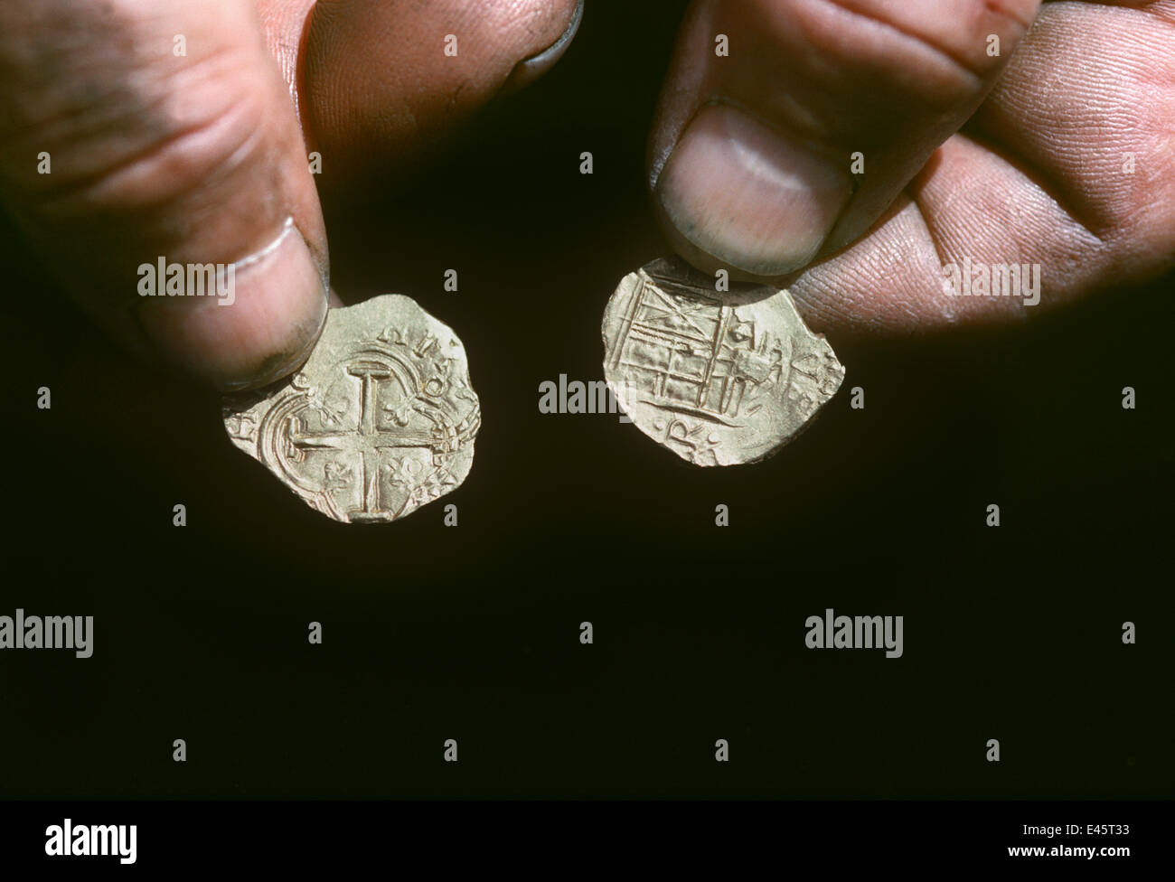Gold coins recovered from the shipwreck 'Las Maravillas', a Spanish galleon sunk in 1658, Bahamas. 1987. model released Stock Photo