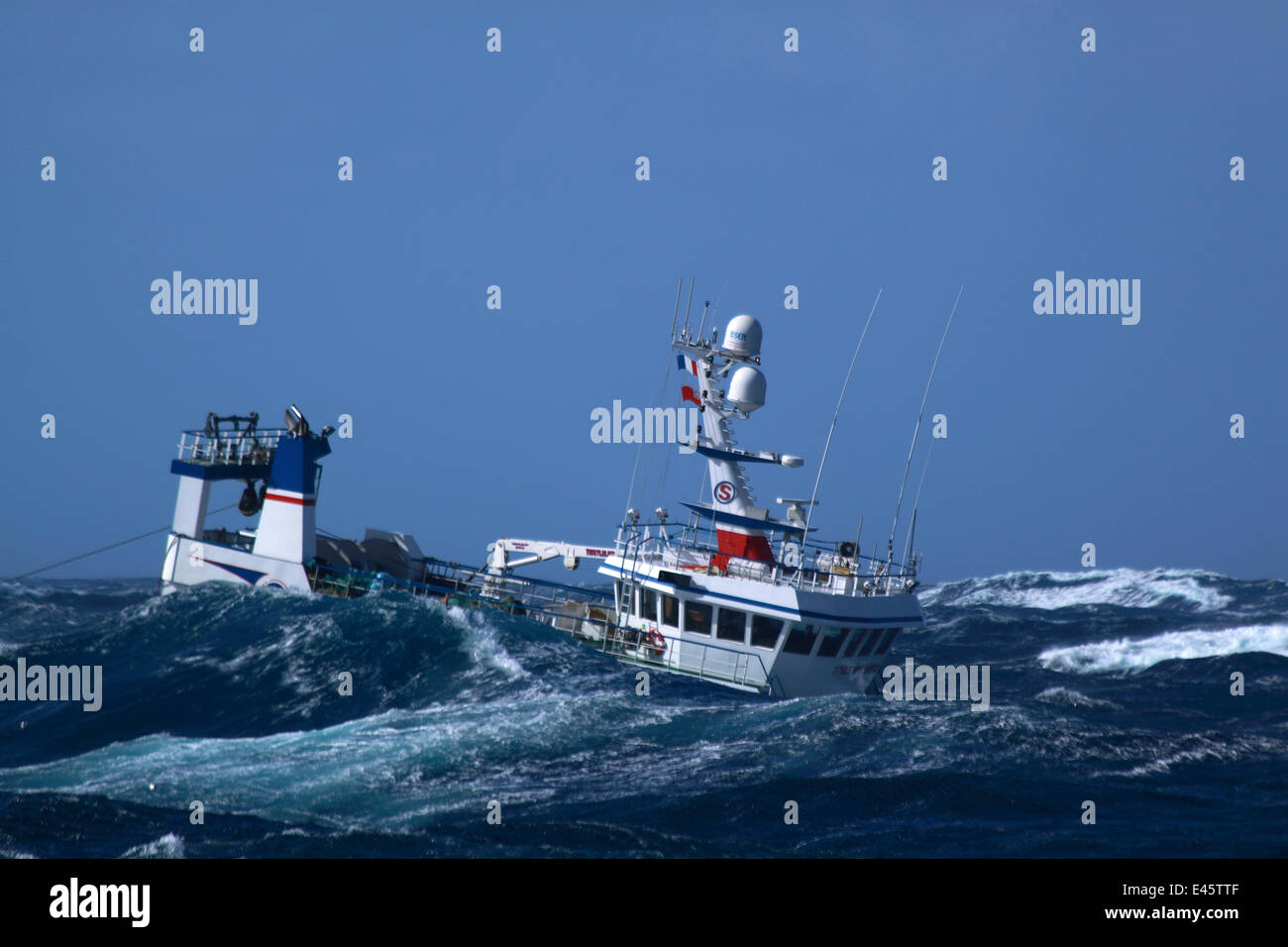 Fishing vessel 'Ocean Harvest' in huge waves on the North Sea, September 2010. Property released. Stock Photo