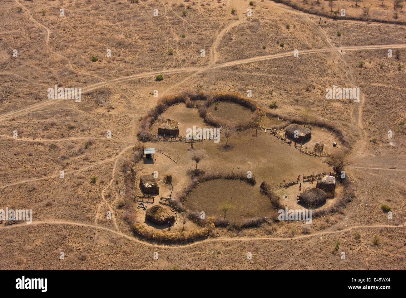 Aerial view of Maasai fenced homestead, with buildings and livestock enclosures. Kenya, Africa, August 2009 Stock Photo