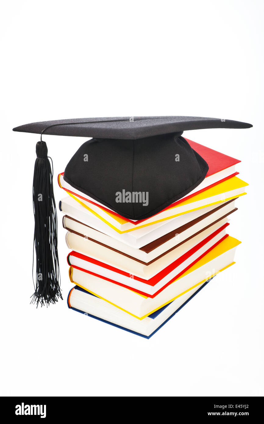 A mortarboard on a book stack on white background. Icon image for costs ...