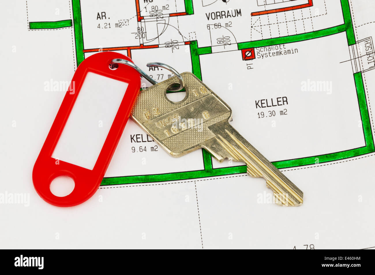 The key to an apartment and a plan in the German language. with Euro