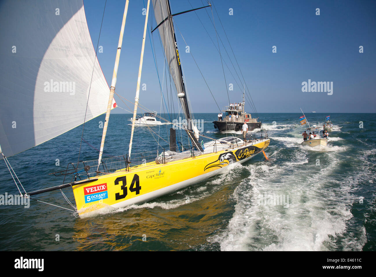 'Le Pingouin' skippered by Brad Van Liew finishing first in sprint four of the Velux 5 Oceans race. Charleston, South Carolina, USA, April 2011. All non-editorial uses must be cleared individually. Stock Photo
