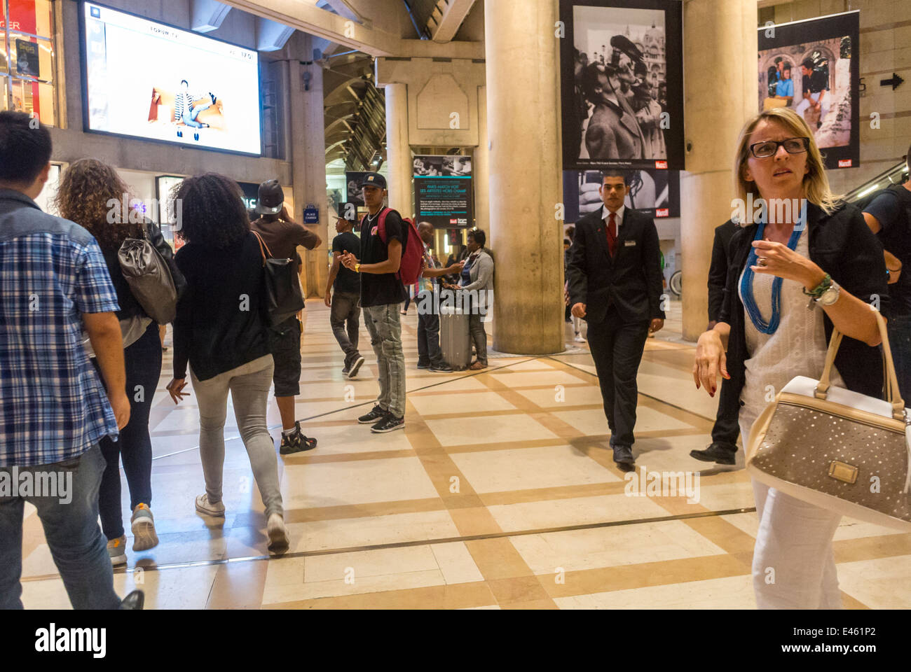 Paris, France, Crowd People Shopping in Les Halles Paris Inside 'Le Forum des Halles' Shopping Center, Mall, Hallway with Photography Exhibit Stock Photo