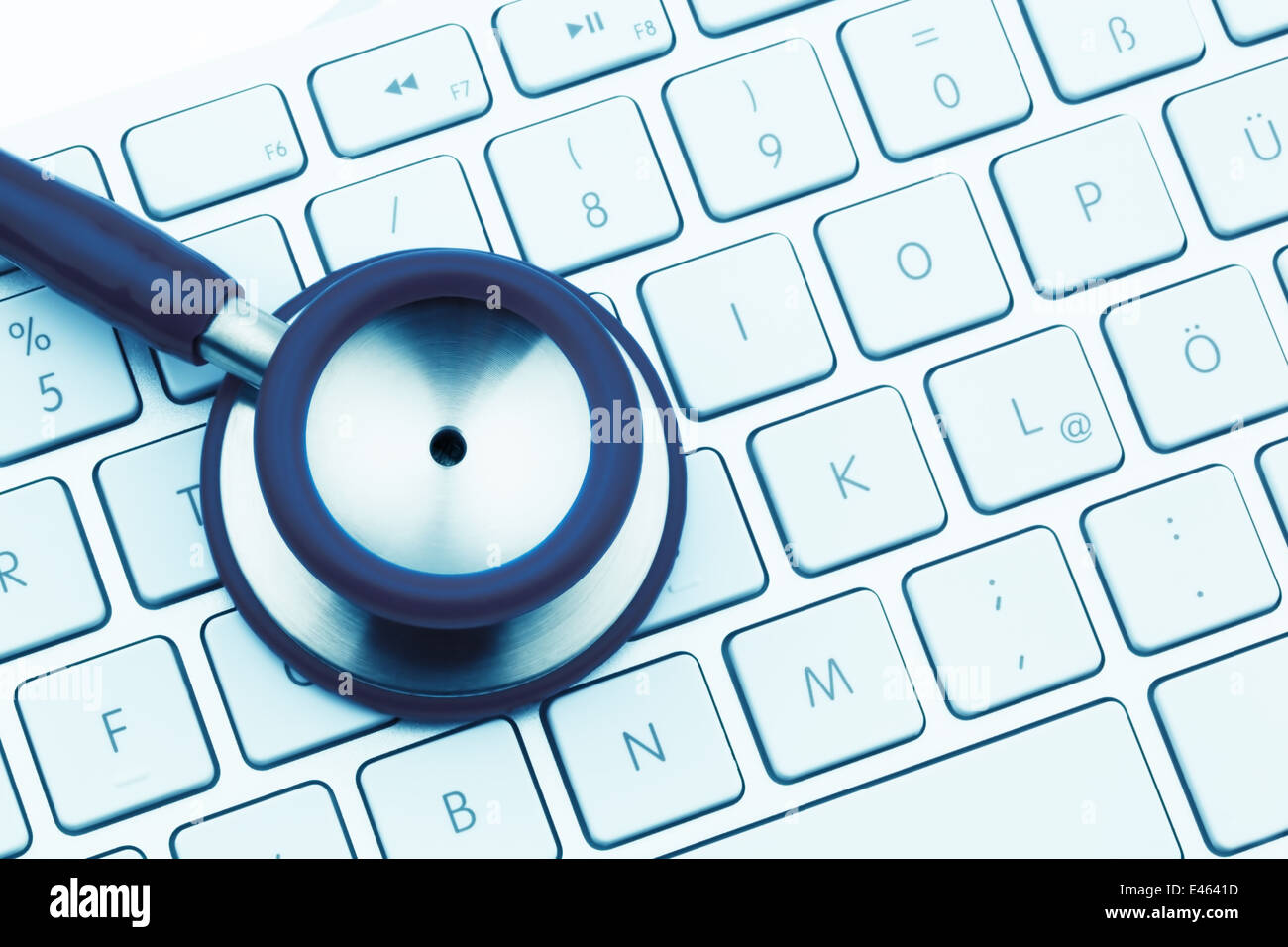 A stethoscope and a keyboard of a computer Stock Photo - Alamy