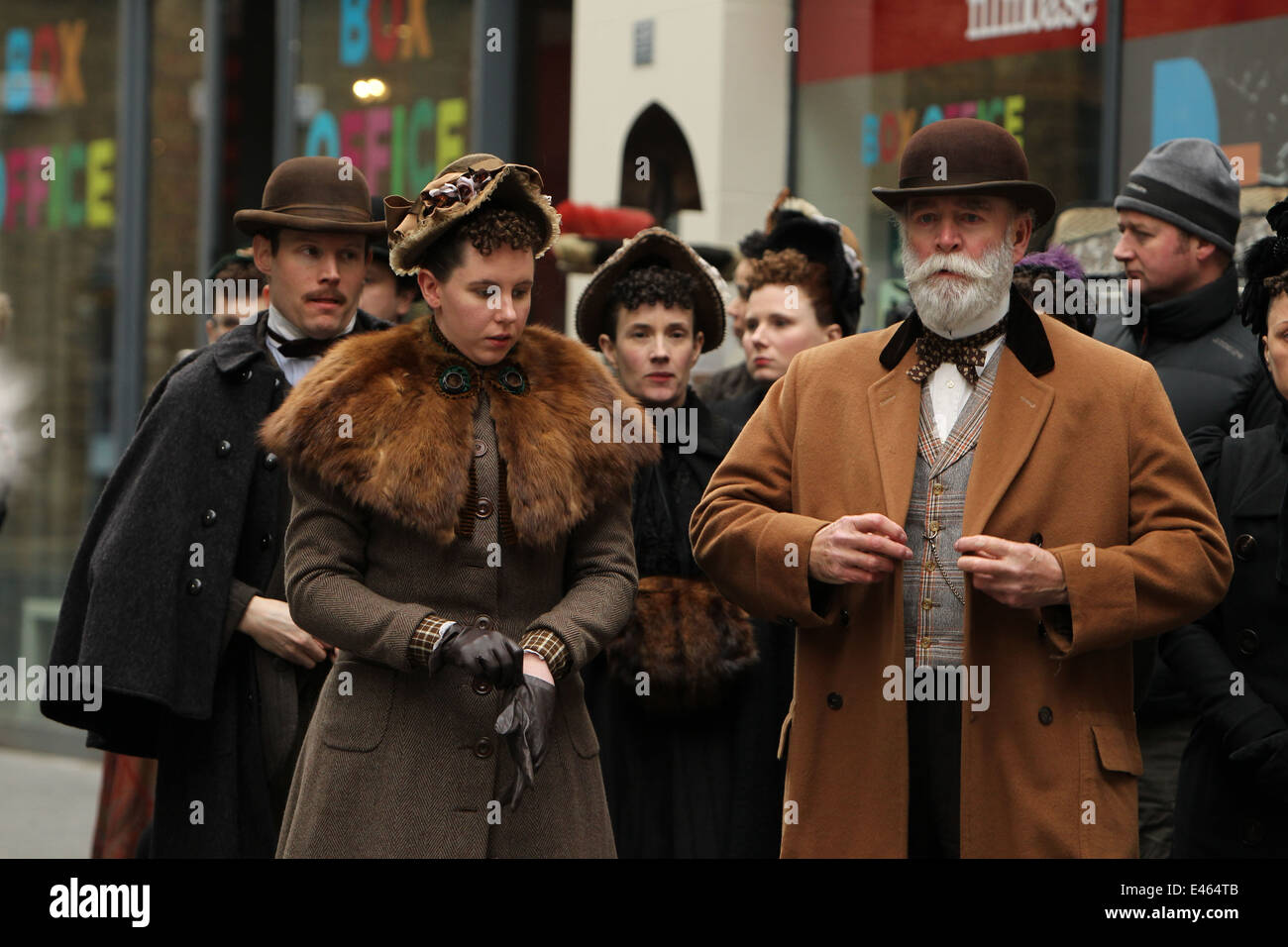 Actors in period costume from the on street set of Victorian horror tv series 'Penny Dreadful'. Stock Photo