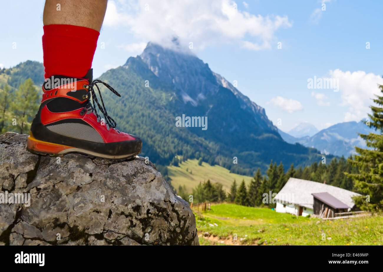 Red hiking boots on a hike in the mountains of Austria. Activity during  leisure time Stock Photo - Alamy