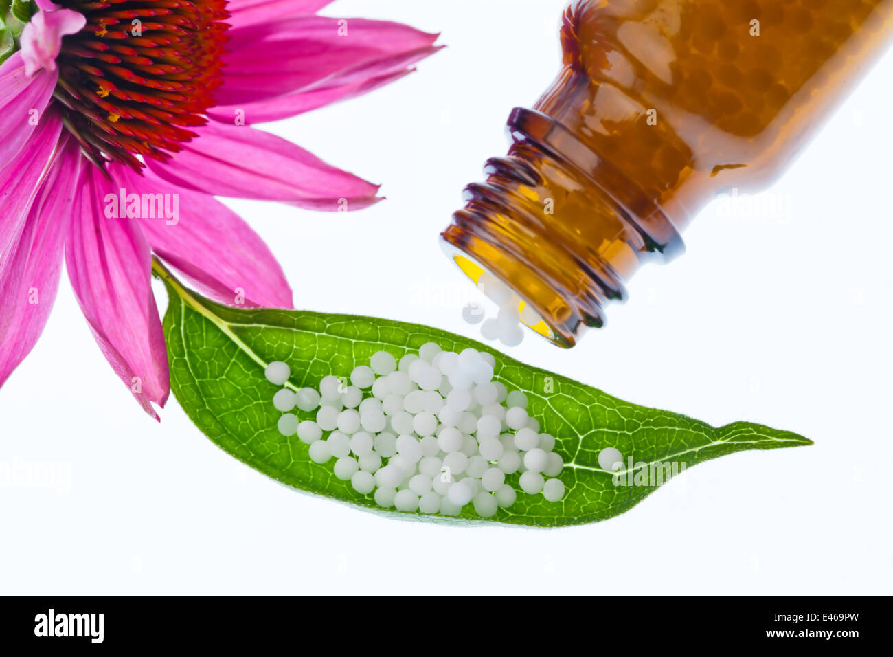 Globules in the treatment of diseases in the gentle, alternative medicine. Tablets and medicines. Stock Photo