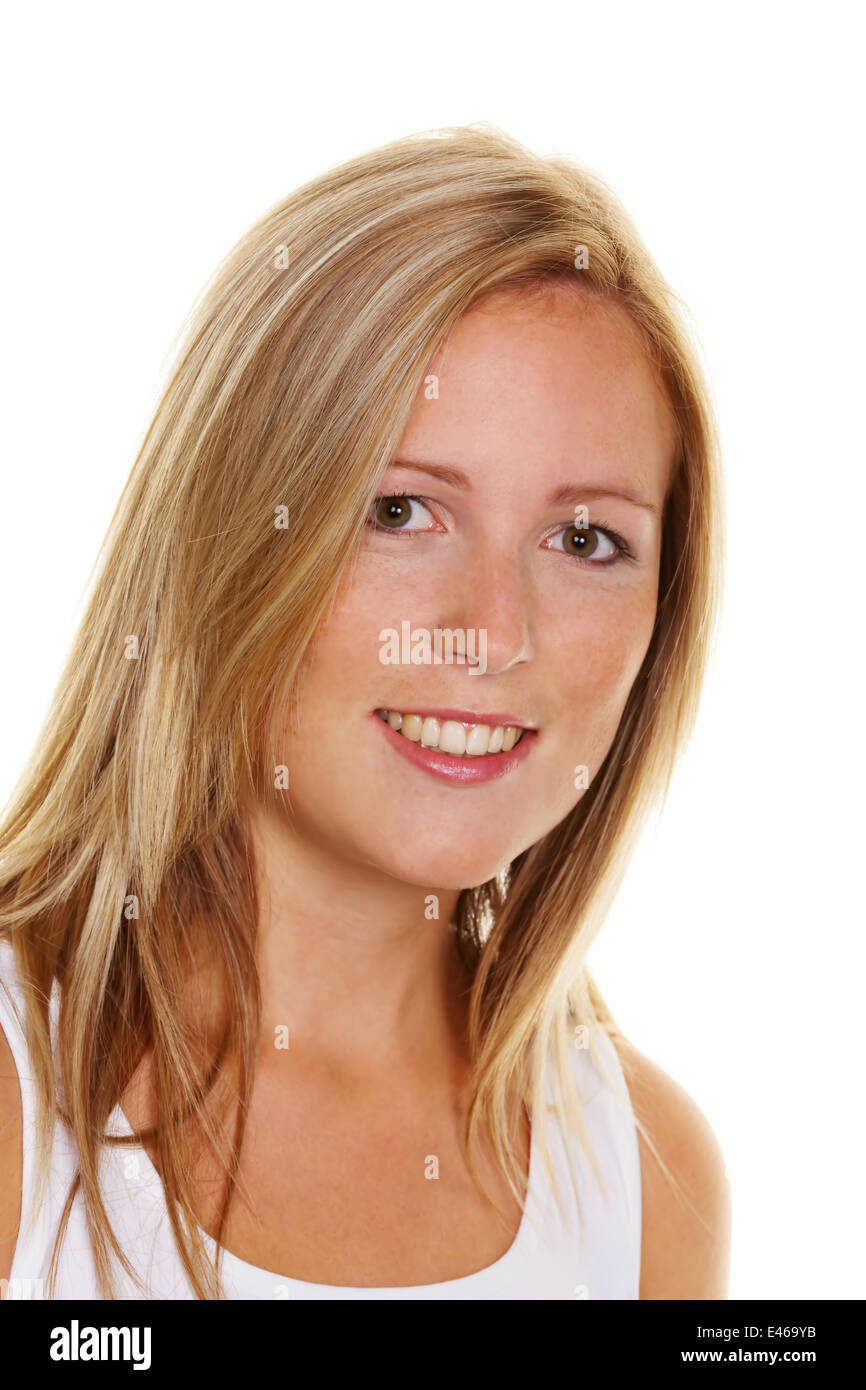 Portrait of a young blonde woman with freckles on a white background Stock Photo
