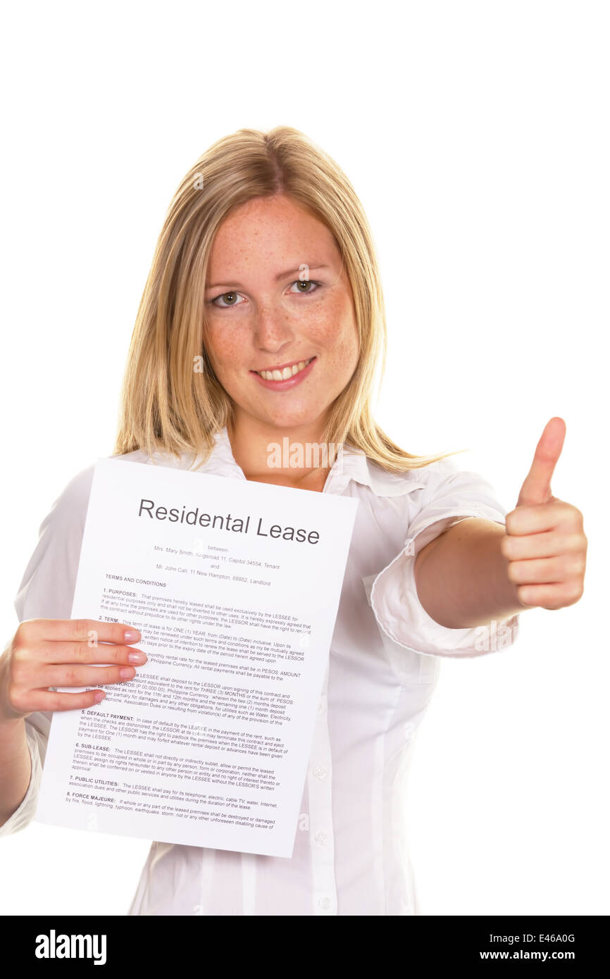 A young woman has successfully completed a lease. In English Stock Photo