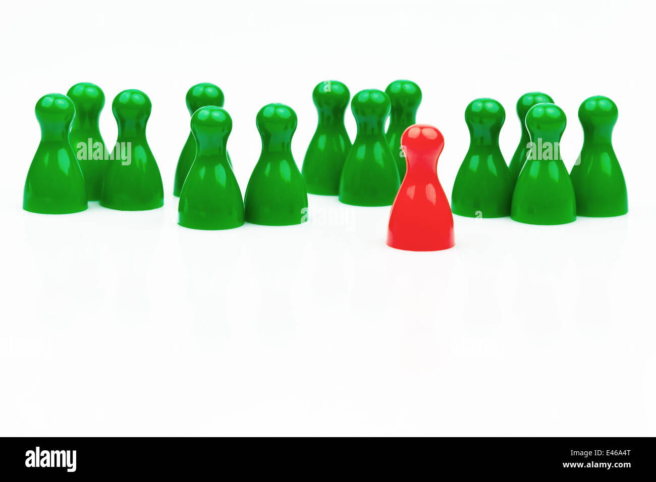 Red and green tokens. Manager and leader of the team. Stock Photo