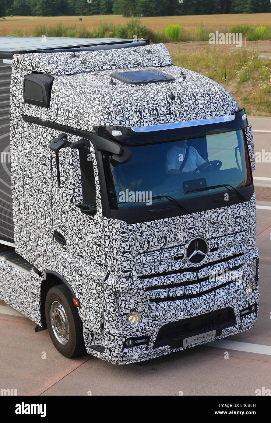Colbitz, Germany. 03rd July, 2014. The Mercedes-Benz Future Truck 2025 is  seen during its world premier at the Autobahn A14 in Colbitz, Germany, 03  July 2014. World market leader for trucks Daimler