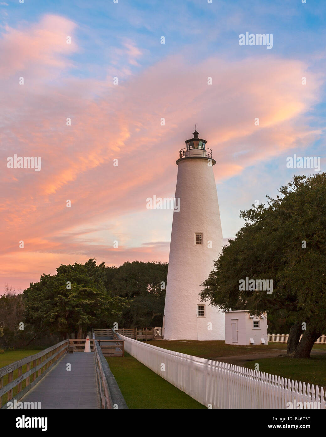 Cape Hatteras National Seashore, NC: Colorful sunrise at Ocracoke Island Lighthouse (1823) on Ocracoke Island Stock Photo