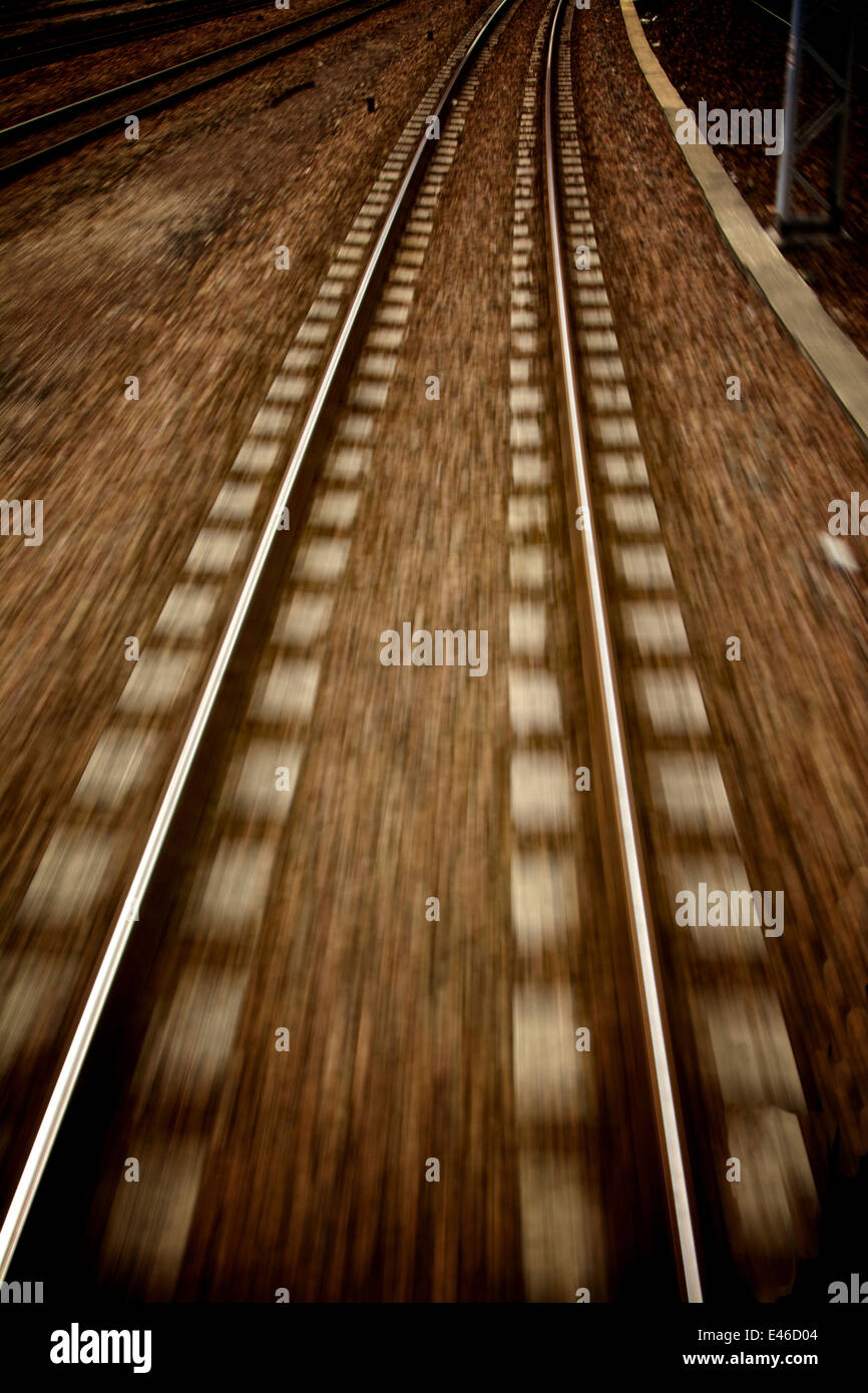 Railway train track with motion blur Stock Photo