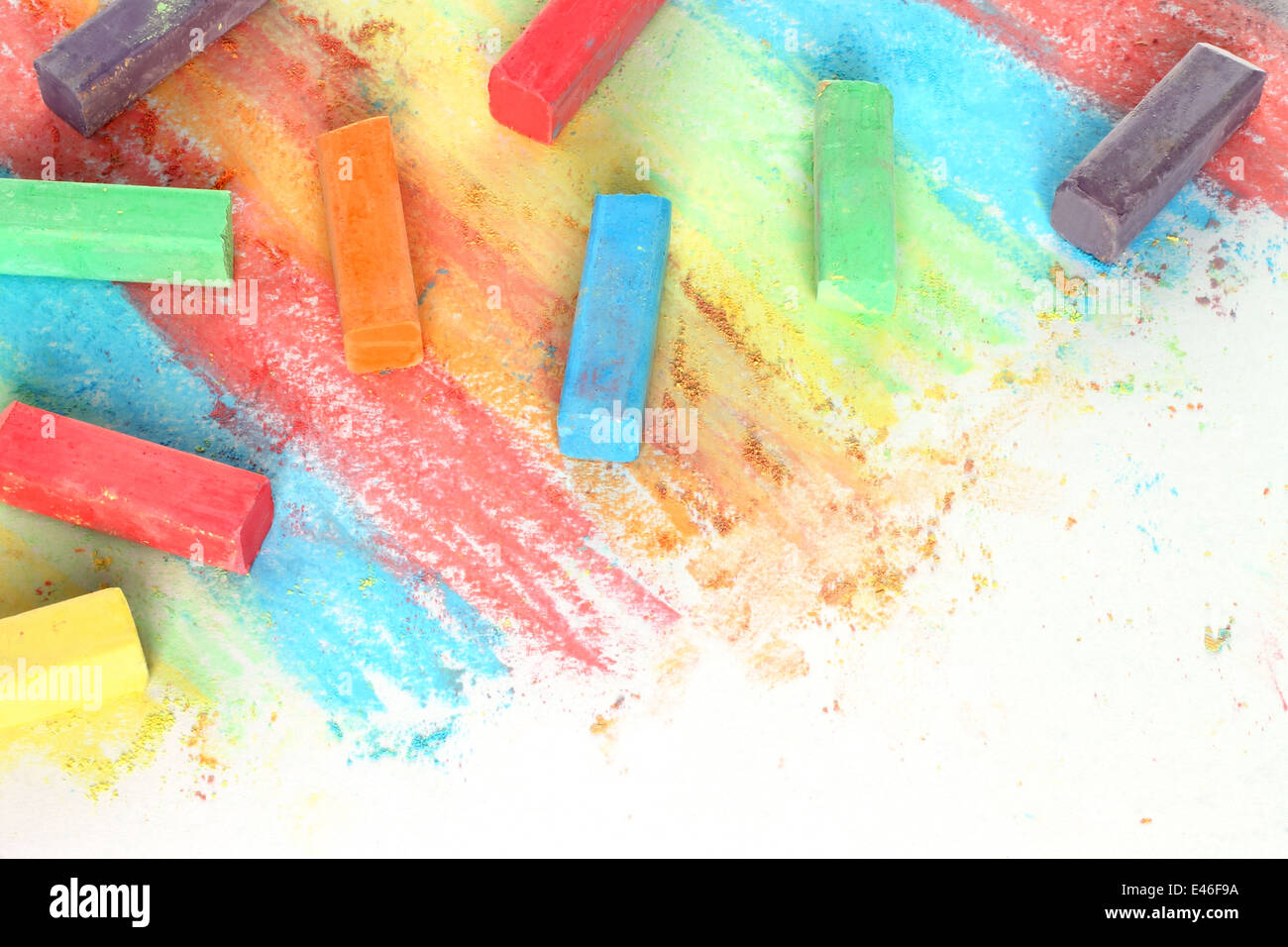 Color pieces of chalk on white background Stock Photo