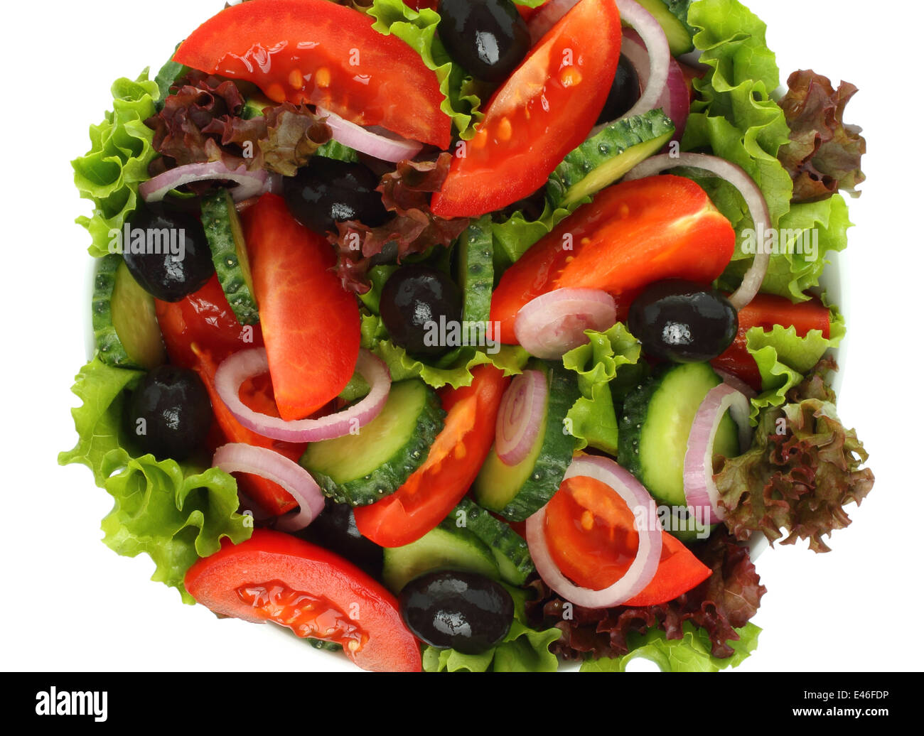 Salad of fresh vegetables on white background Stock Photo - Alamy