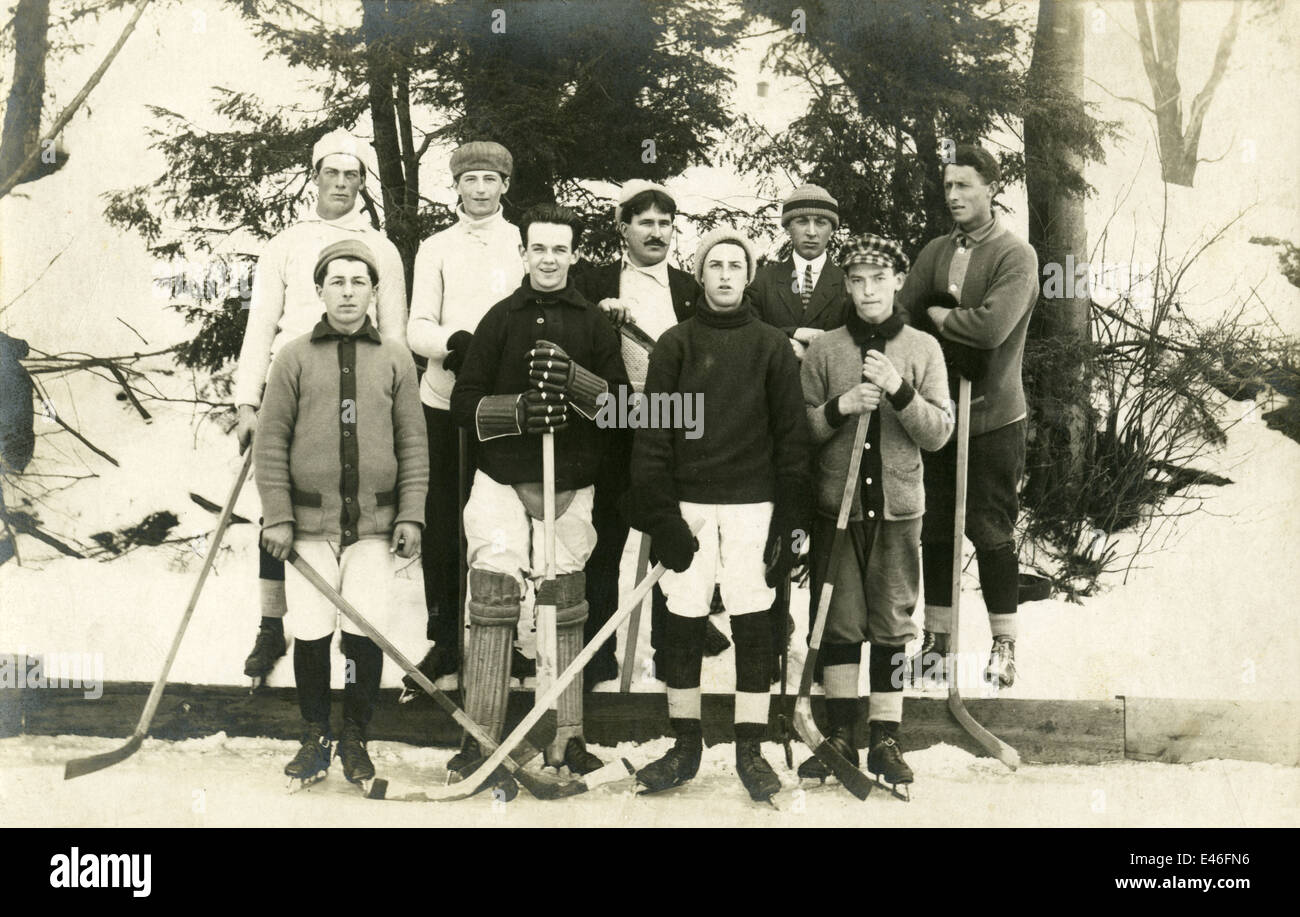 Antique photograph, circa 1910 image of a boys' pickup ice hockey team
