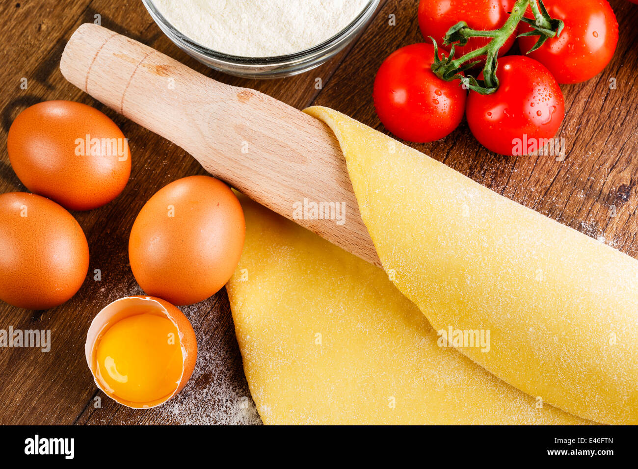 homemade dough with a rolling pin Stock Photo