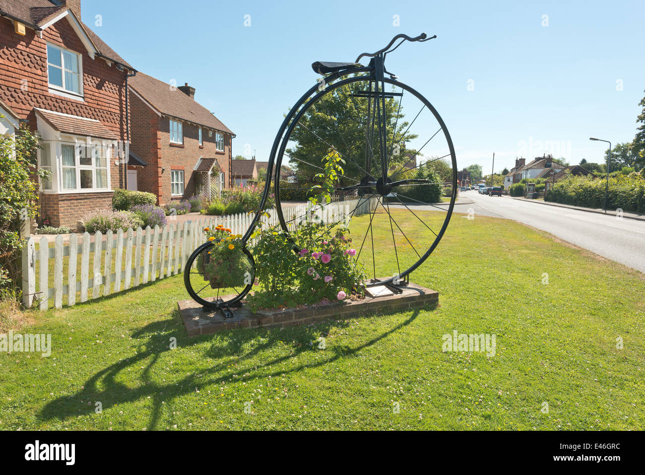 Penny farthing bicycle sculpture at entrance of Sissinghurst village to celebrate Tour de France 8th July 2007 Stock Photo
