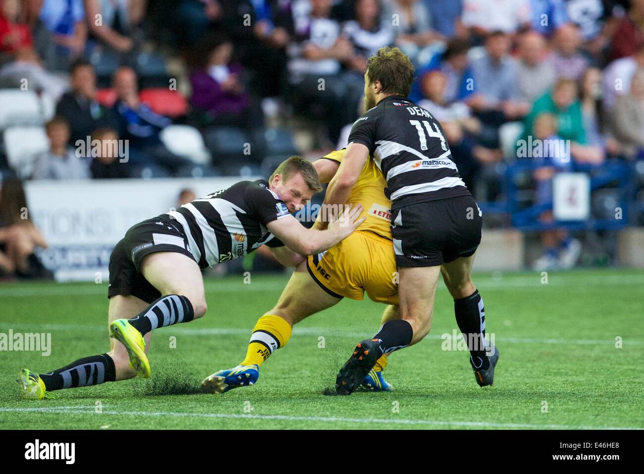 Widnes, UK. 03rd July, 2014. First Utility Super League Rugby. Widnes Vikings versus Castleford Tigers. Castleford Tigers prop Lee Jewitt and Widnes Vikings centre Chris Dean in action. Credit:  Action Plus Sports/Alamy Live News Stock Photo