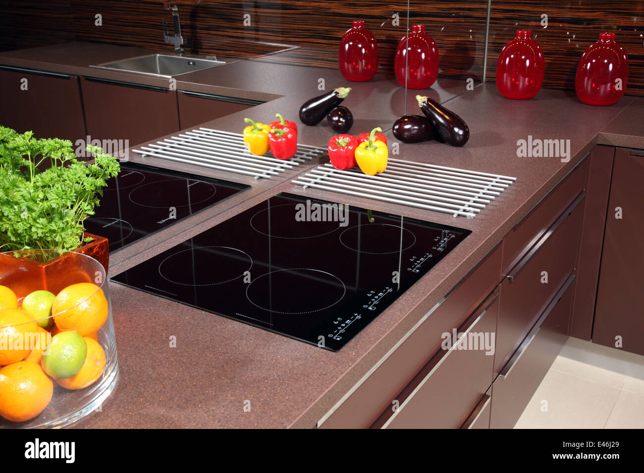 Modern kitchen with glass induction hob Stock Photo Alamy