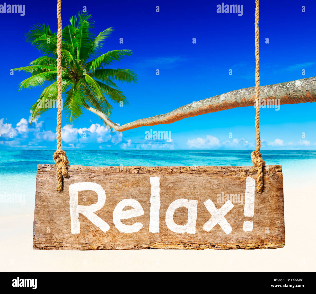 Beautiful Beach Scenery With Palm Coconut Tree And A Sign Relax Stock Photo