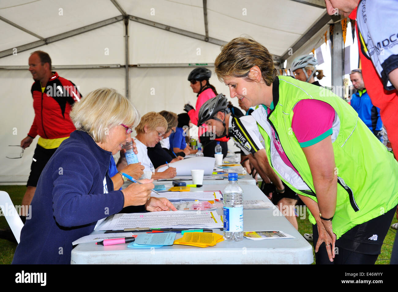 Cyclists registering to take part in a cycle sportive mass participation challenge ride. Stock Photo