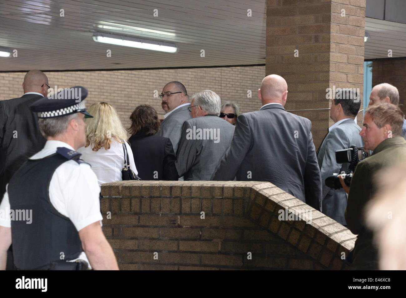 London, UK. 4th July, 2014. Rolf Harris arrives at court for sentencing on 12 counts of indecent assault. Credit:  See Li/Alamy Live News Stock Photo