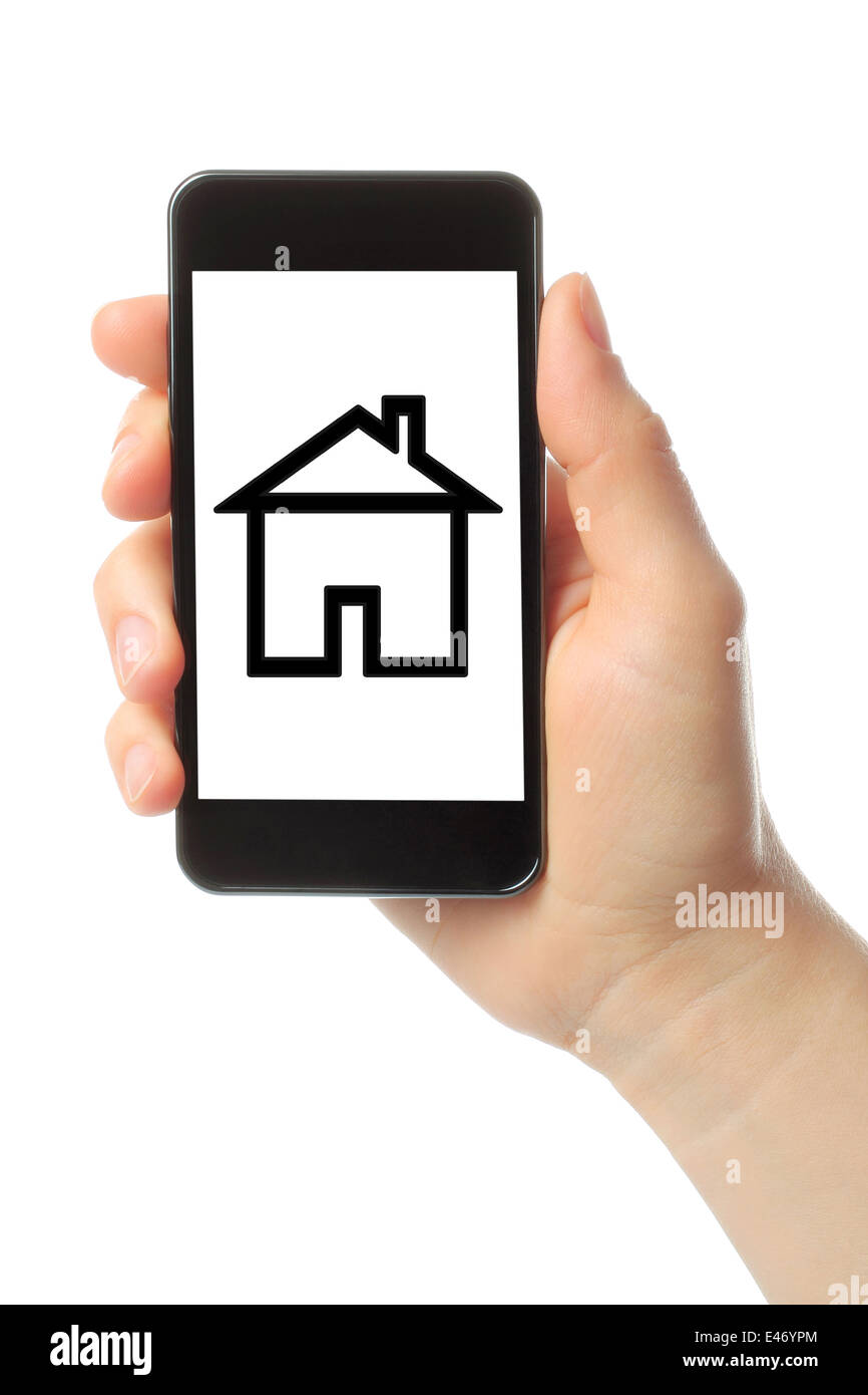 Hand with smart phone and house on white background Stock Photo