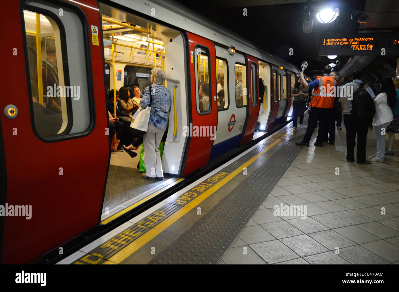 London underground train and platform Stock Photo Alamy
