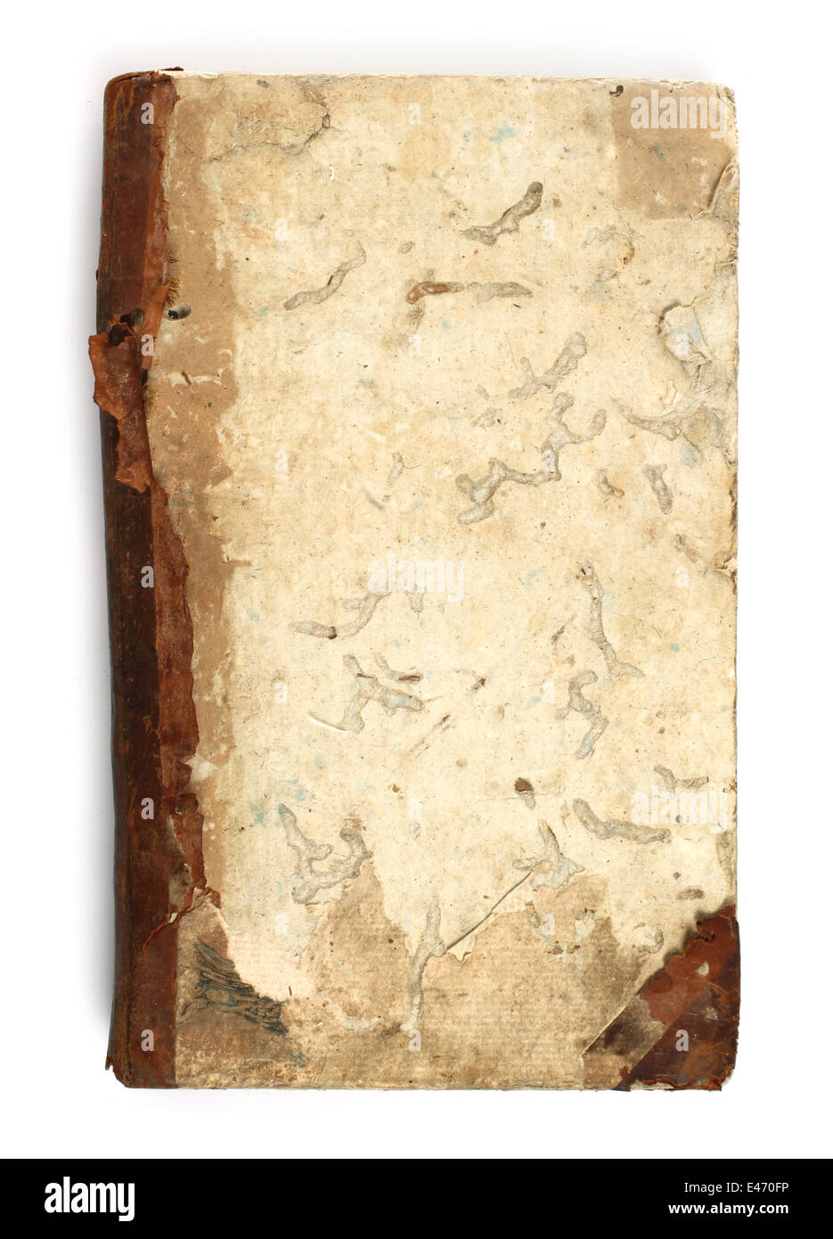 Old book eaten by bookworm on white background Stock Photo