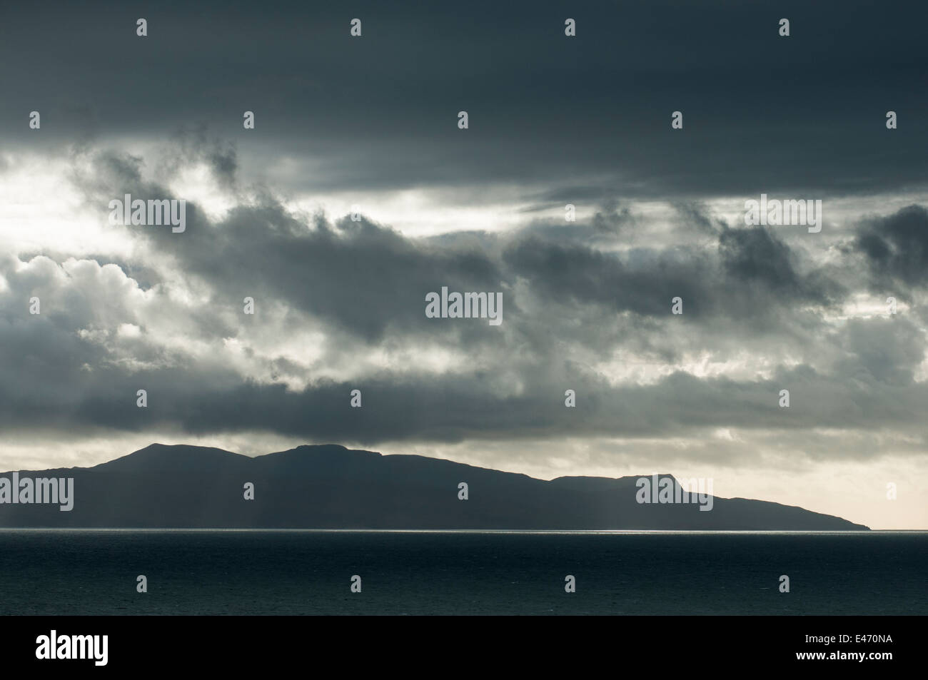 Stormy skies across the sea, among the western Isles of Scotland. Stock Photo