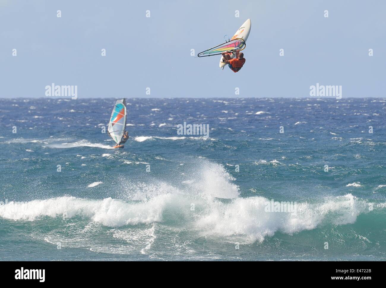 A windsurfer jumps at the Hookipa Park near Kahului (Maui Stock Photo