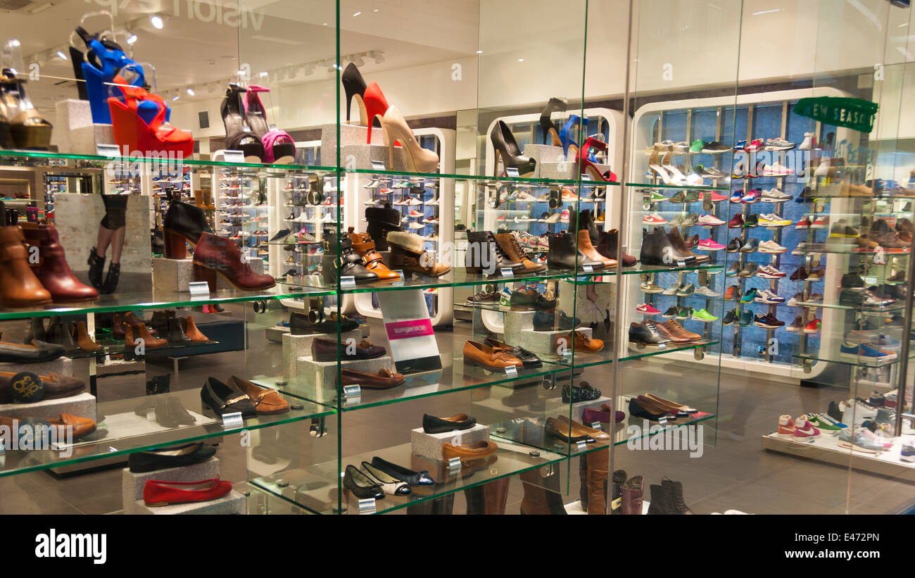 Display of shoes in a store window Stock Photo