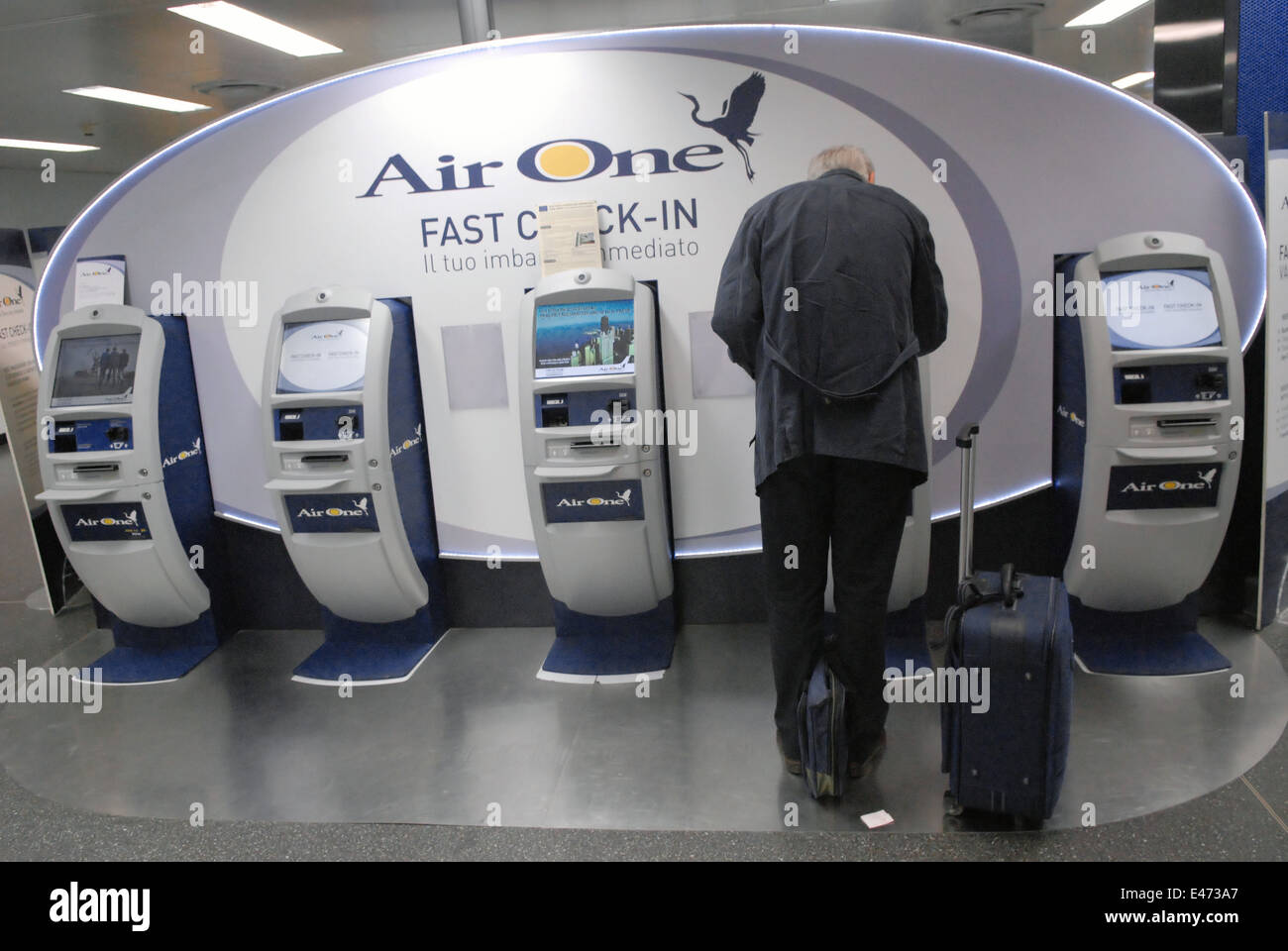 airport of Milan Linate (Italy), automatic check-in of AirOne company Stock Photo