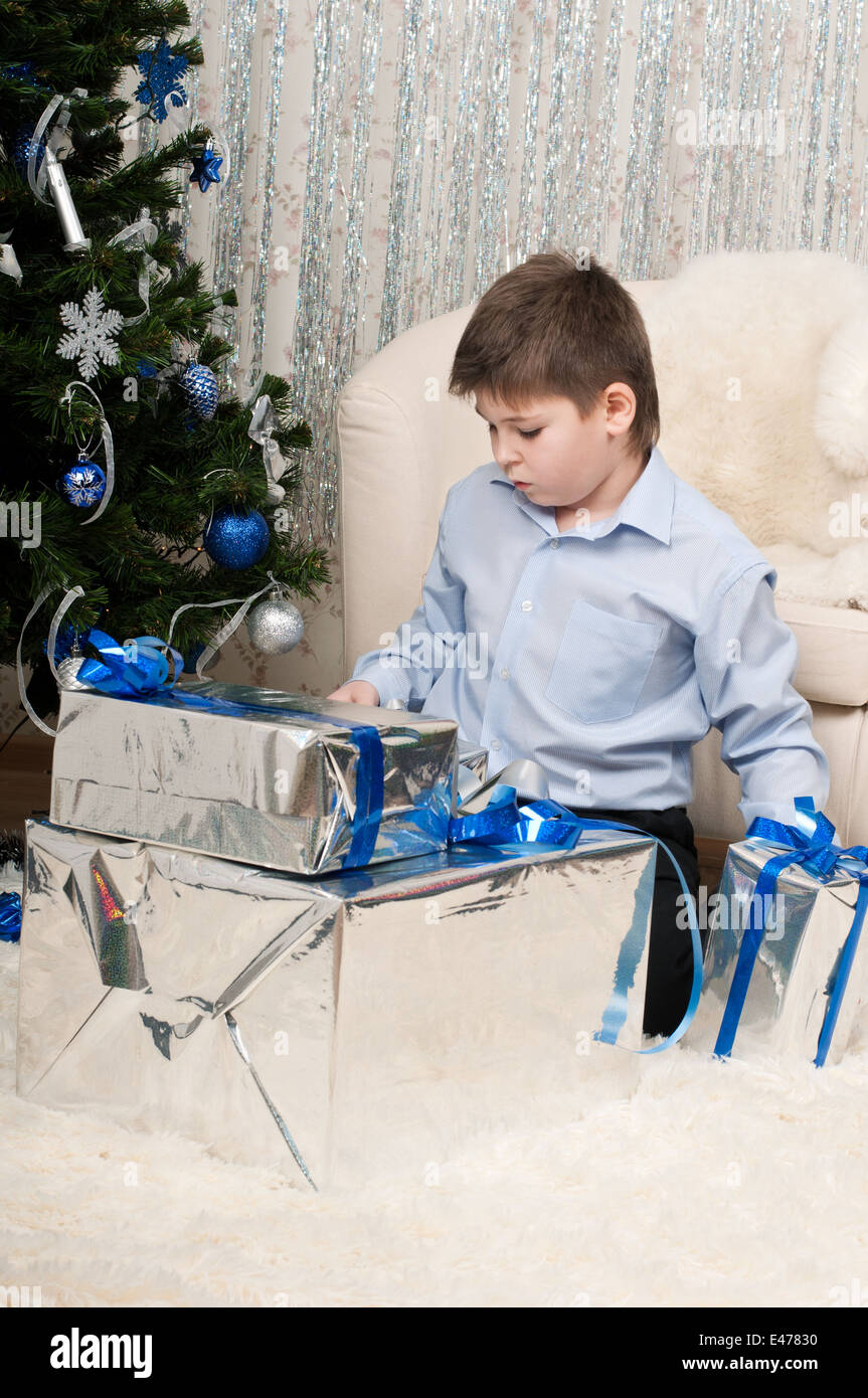 boy child kid present gift festive christmas tree one eight years box