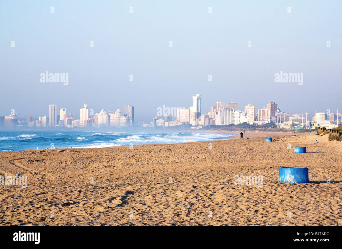 View of smoggy Durban city skyline from La Lucia beach in South Africa Stock Photo