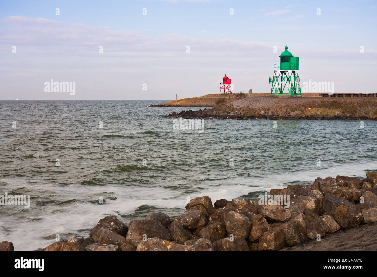 Entrance with lighthouses at the harbor of Stavoren in the Netherlands Stock Photo