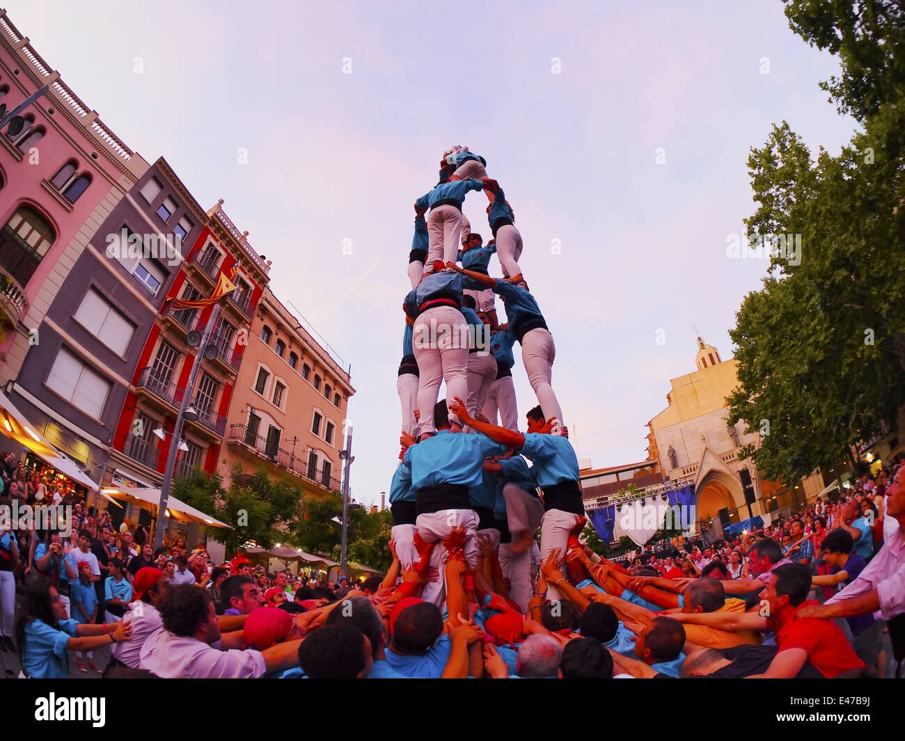 Castells Performance in Terrassa, Catalonia, Spain. A castell is a human tower built traditionally in festivals. Stock Photo