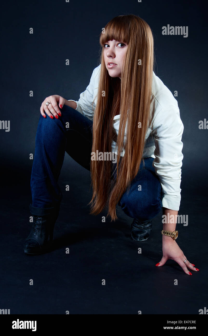 Blond Hair. Beautiful girl with Straight Long Hair wearing casual clothing Stock Photo