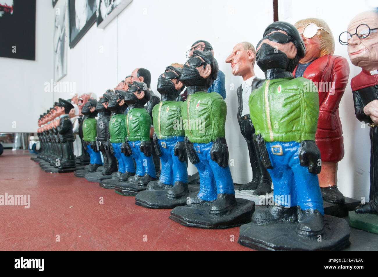 Northern Ireland themed chess set with masked paramilitaries on the Catholic side, and RUC officers on the Protestant. Stock Photo