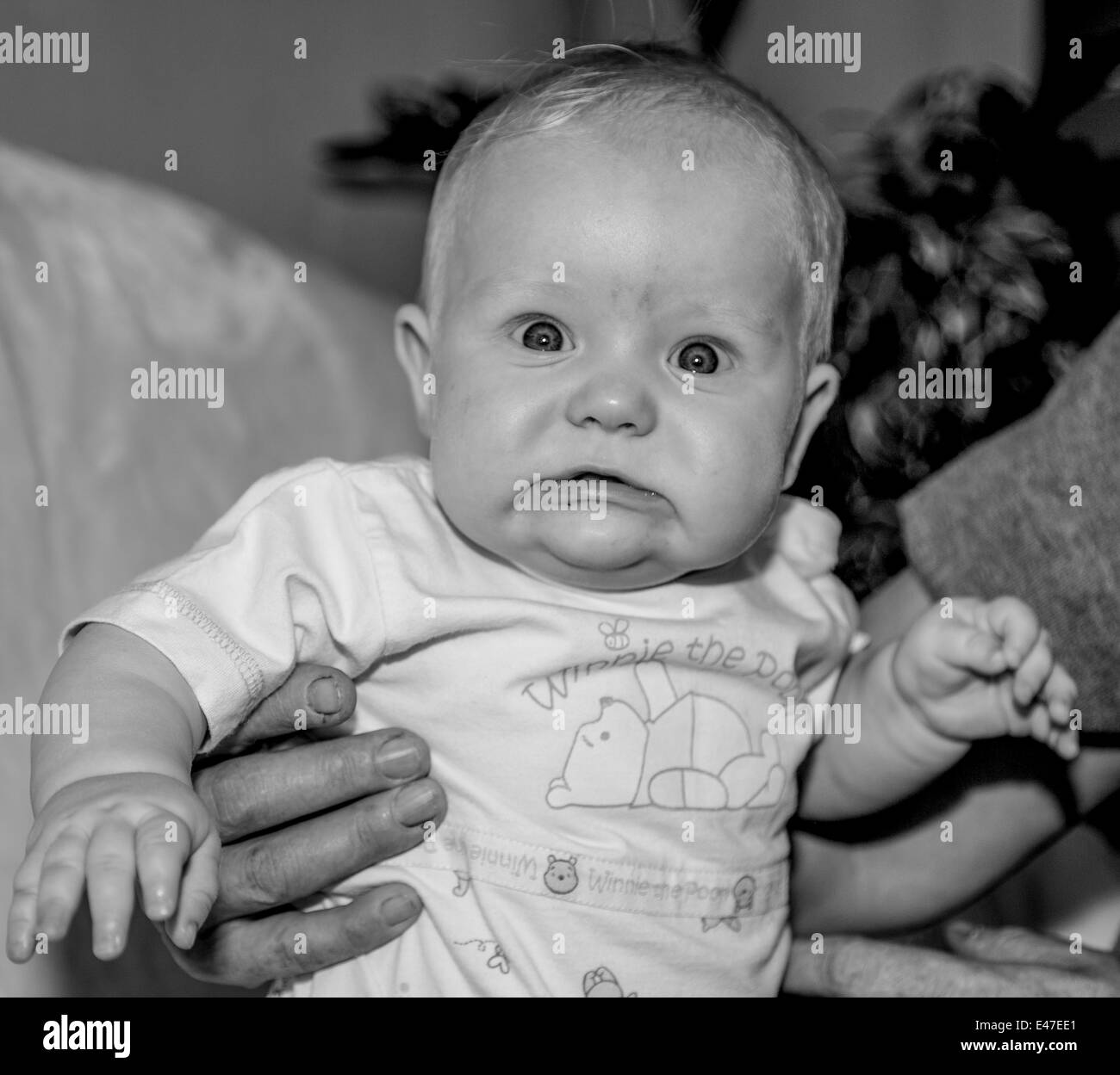 Frightened baby boy Stock Photo