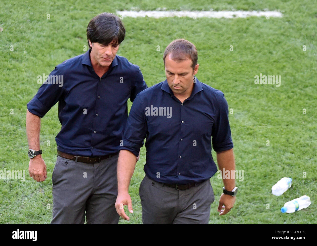 Rio de Janeiro, Brazil. 04th July, 2014. Head coach Joachim Loew of Germany and assistant coach Hansi Flick (R) during the FIFA World Cup 2014 quarter final soccer match between France and Germany at Estadio do Maracana in Rio de Janeiro, Brazil, 04 July 2014. Photo: Marcus Brandt/dpa/Alamy Live News Stock Photo