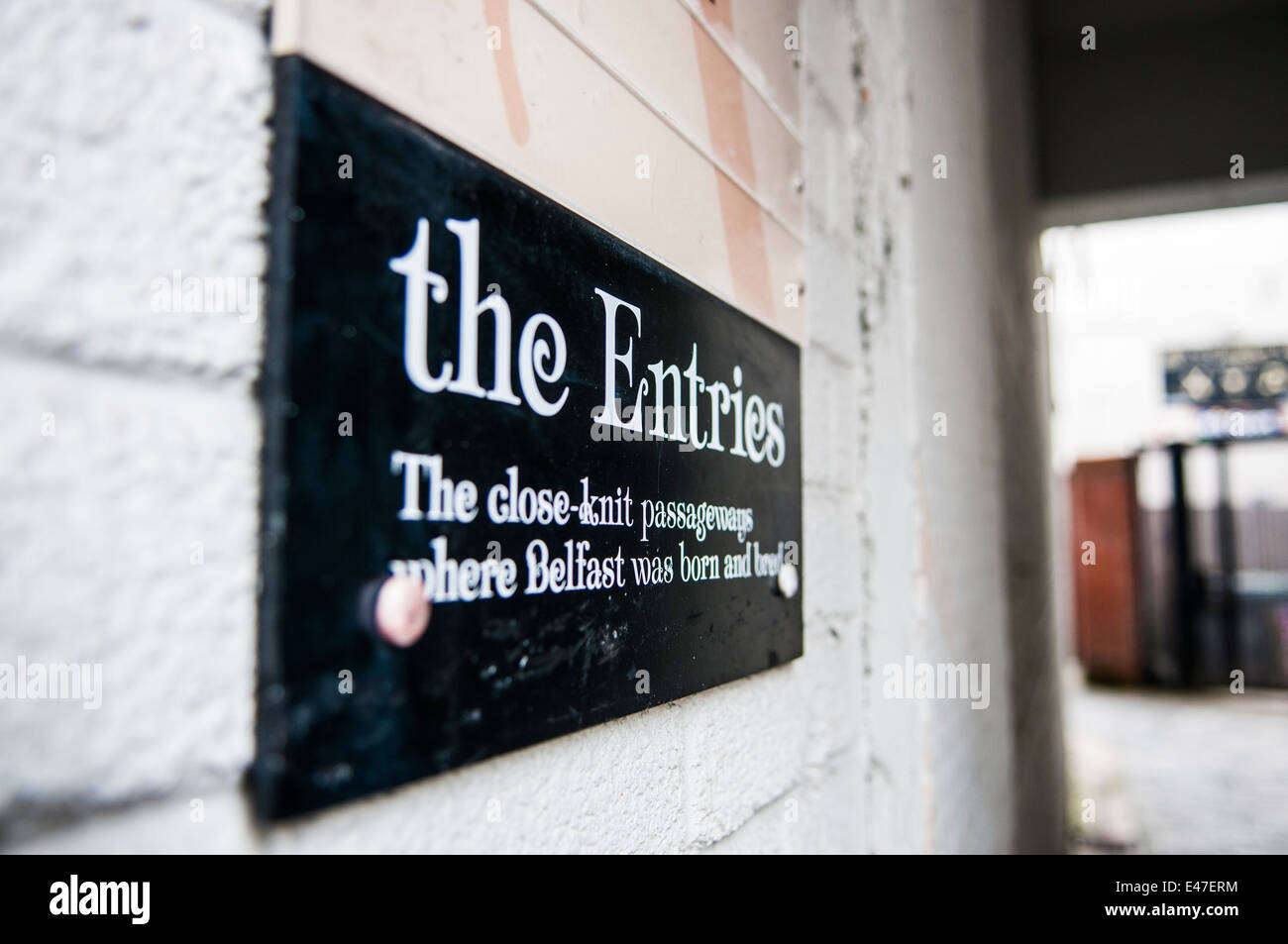 Sign for 'The Entries' in Belfast - a series of narrow passageways linking main streets in the city centre. Stock Photo