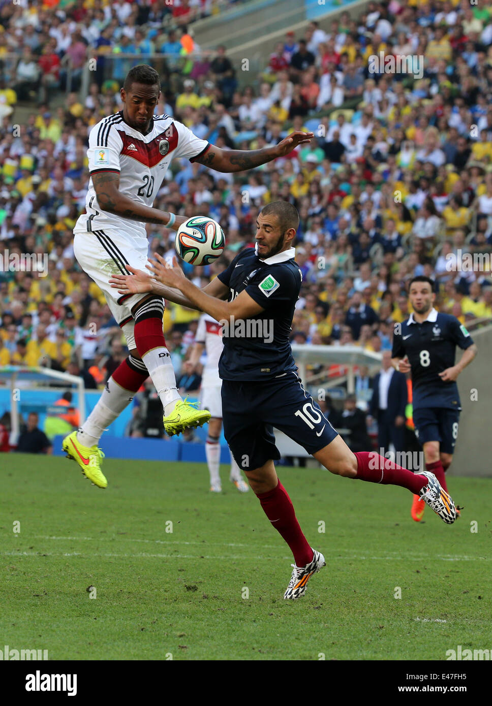 Rio De Janerio, Brazil. 04th July, 2014. FIFA World Cup 2014 quarter final soccer match between France and Germany at Estadio do Maracana in Rio de Janeiro, Brazil. Boateng wins the header over Benzema Credit:  Action Plus Sports/Alamy Live News Stock Photo