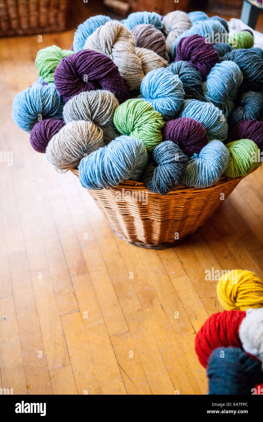 Wicker basket of  yarn wool skeins Stock Photo