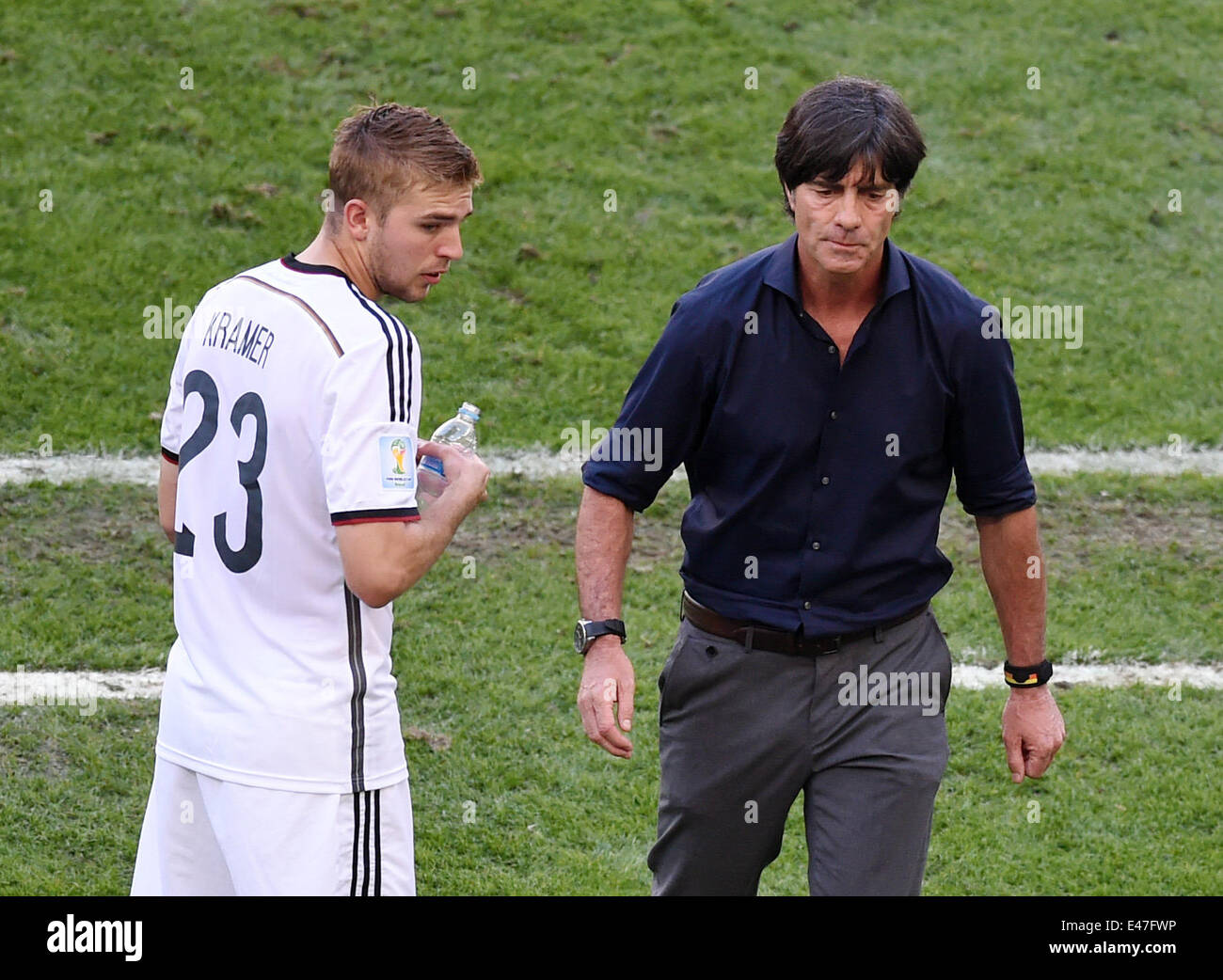 Rio de Janeiro, Brazil. 04th July, 2014. Head coach Joachim Loew (R) of Germany Christoph Kramer (L) of Germany during the FIFA World Cup 2014 quarter final soccer match between France and Germany at Estadio do Maracana in Rio de Janeiro, Brazil, 04 July 2014. Photo: Marcus Brandt/dpa/Alamy Live News Stock Photo