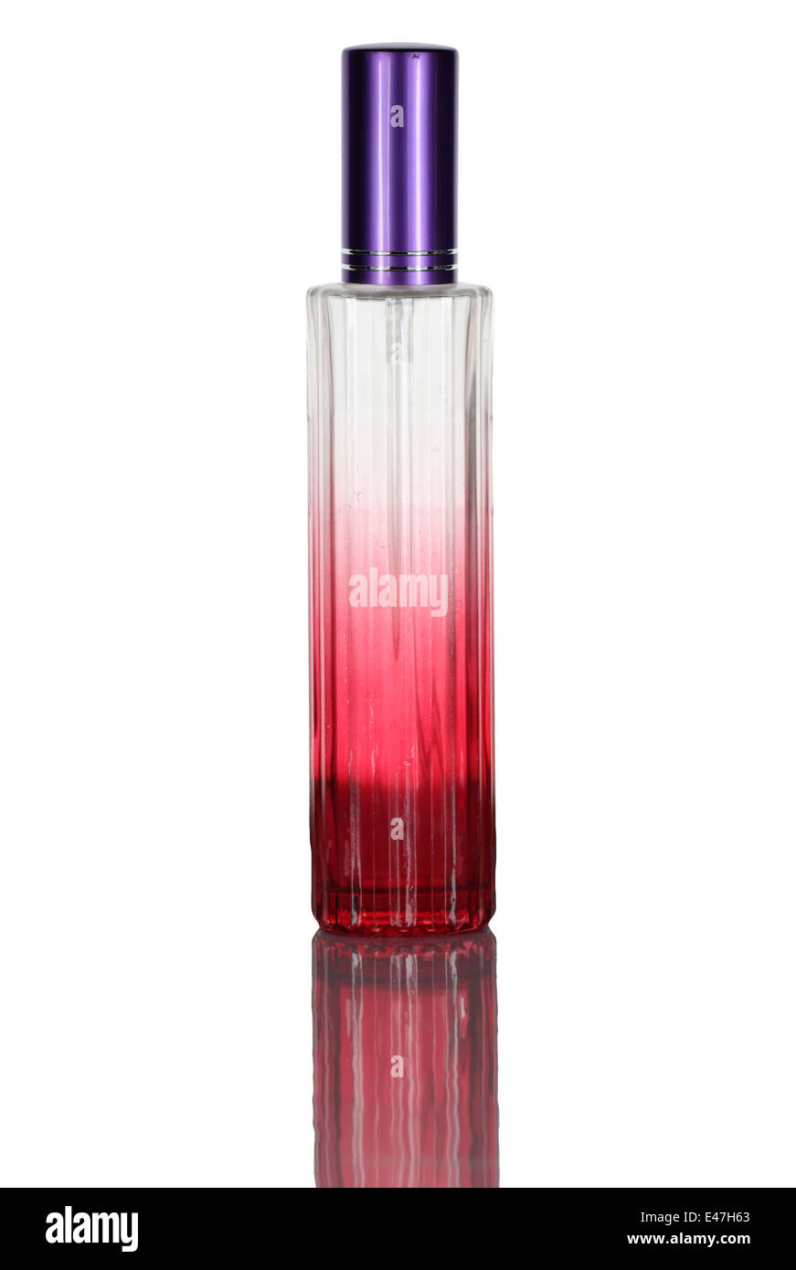 Red perfume bottle isolated on white background. Stock Photo
