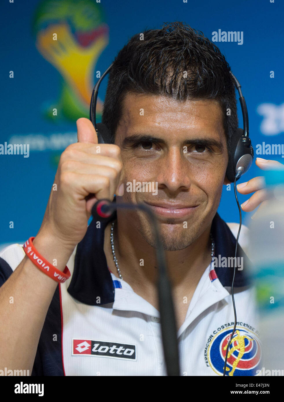 Salvador, Brazil. 4th July, 2014. Costa Rica's Johnny Acosta makes a gesture at a press conference in Salvador, Brazil, on July 4, 2014, one day ahead of a quarter-finals match between Netherlands and Costa Rica of 2014 FIFA World Cup. Credit:  Yang Lei/Xinhua/Alamy Live News Stock Photo