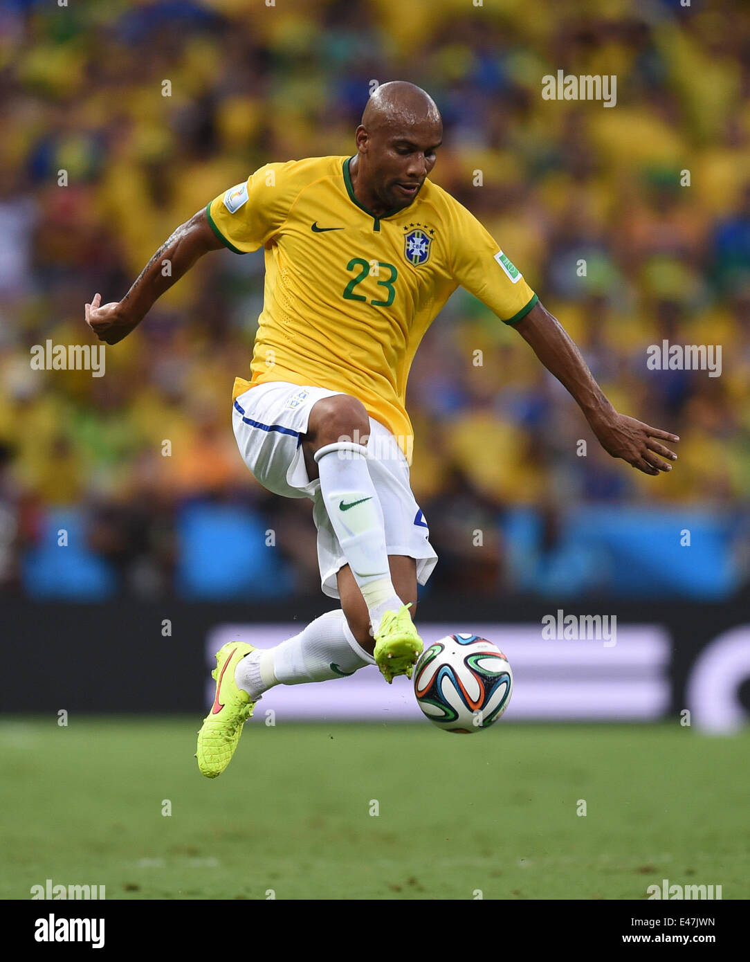 Fortaleza, Brazil. 04th July, 2014. Maicon of Brazil in action during the FIFA World Cup 2014 quarter final match soccer between Brazil and Colombia at the Estadio Castelao in Fortaleza, Brazil, 04 July 2014. Photo: Marius Becker/dpa/Alamy Live News Stock Photo